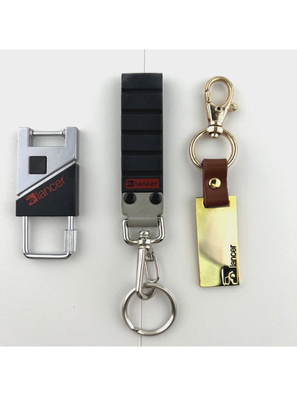 Lot of 3 Vintage 80s Lancer Car Automobile Keyring Key Chain